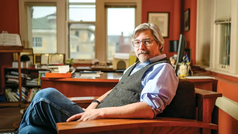 Paul Robbins sitting in his office.