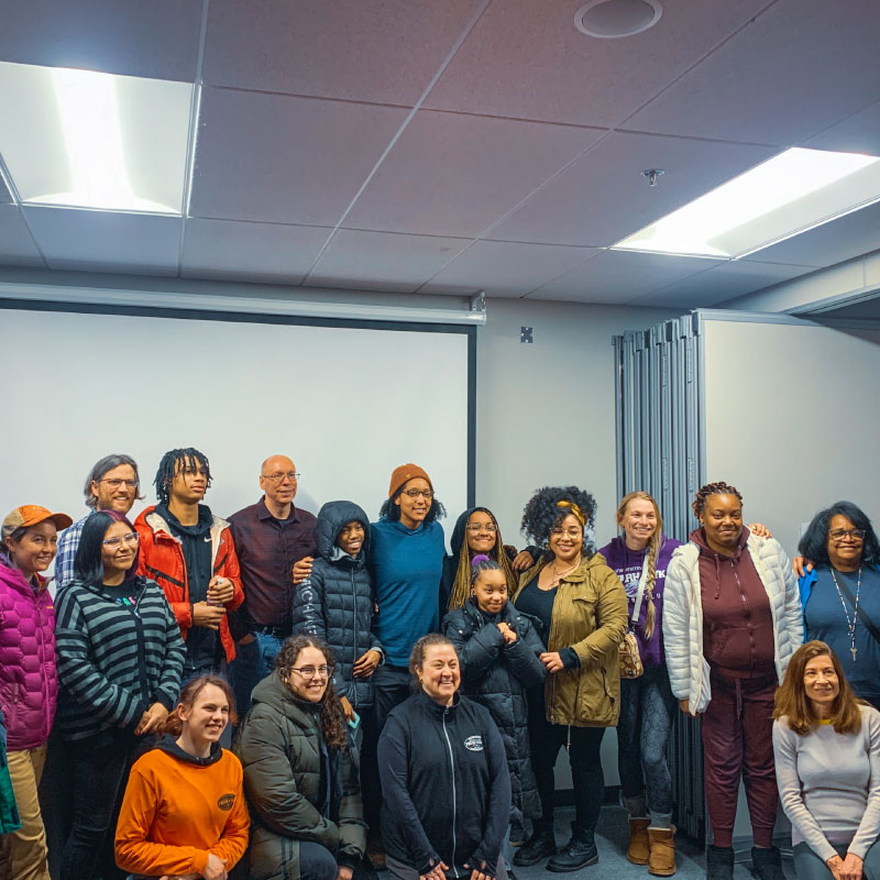 8.	Emily Ford joins alumni and friends of the Odyssey Project after the screening and Q & A. Photo by Alessandra Rella