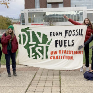 Banner drop outside of a Board of Regents Meeting. Photo courtesy of Ashley Cheung
