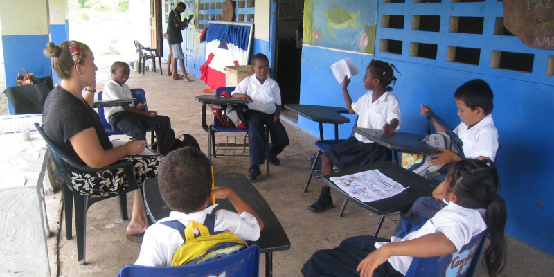 Gries teaching English to elementary school kids while in the Peace Corps in Panama.