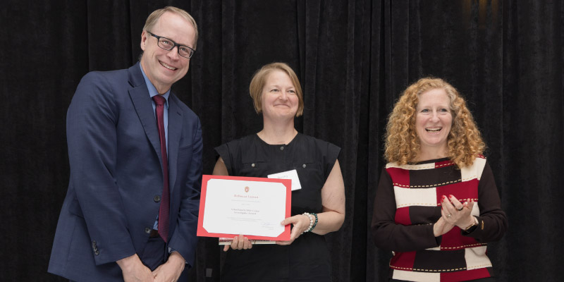 Becky Larson receives Vilas Award for excellence.