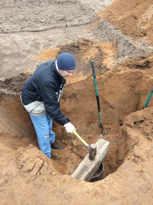 Kucharik helping during installation of a lysimeter in the Wisconsin Central Sands at Isherwood Farms.