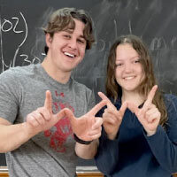Caroline Crawley and Grady LaJeunesse both created websites for their final projects in Geography 309: People, Land and Food. Photo courtesy of Holly Gibbs.