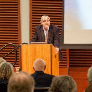 Dean Paul Robbins opened the afternoon’s plenary sessions with a land acknowledgement statement before welcoming the first speaker, Patrick Gonzalez. Photo by Chelsea Rademacher