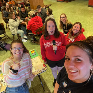 Gooley and the other Nelson Institute ambassadors at last year’s Earth Fest Trivia. Gooley is in the center, holding the microphone. Photo courtesy of Grace Gooley