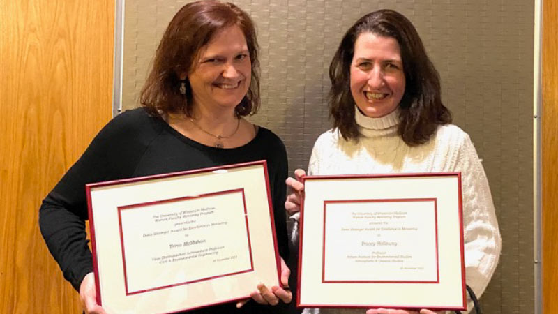 Holloway, along with Vilas Distinguished Achievement Professor Trina McMahon, who both received The Slesinger Award for Excellence in Mentoring during the annual Women Faculty Mentoring Program Reception for Newly Promoted & Tenured Women. Photo courtesy of Tracey Holloway