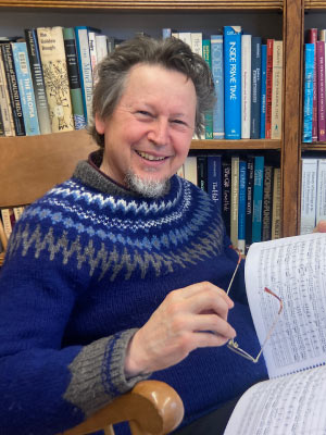 Bell with his new symphony, Regeneration: A Pentalogy. Photo courtesy of Michael Bell