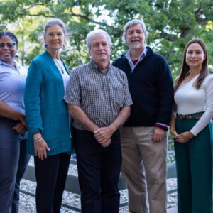 L-R: Jeff Rudd, Laura Miller, Arlyne Johnson, Curt Meine, Dean Paul Robbins, Gloria Castillo Posada, and Emily Reynolds (director of community engagement and alumni relations) celebrate their 2024 alumni awards. Photo by Hedi LaMarr Rudd
