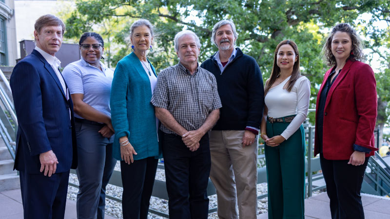 L-R: Jeff Rudd, Laura Miller, Arlyne Johnson, Curt Meine, Dean Paul Robbins, Gloria Castillo Posada, and Emily Reynolds (director of community engagement and alumni relations) celebrate their 2024 alumni awards. Photos by Hedi LaMarr Rudd (5)