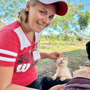 Winkler-Schor with a kitten while conducting research. Photo courtesy of Sophia Winkler-Schor
