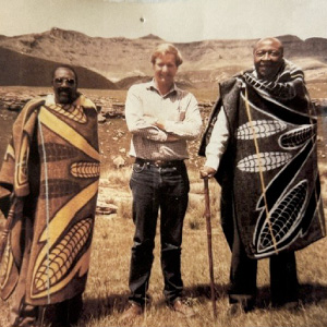 Lawry (center) in Sehlabathebe, Lesotho at the site of his Nelson PhD research along with the chair of the local grazing association (left) and the Principal Chief of the district (right) in 1986.