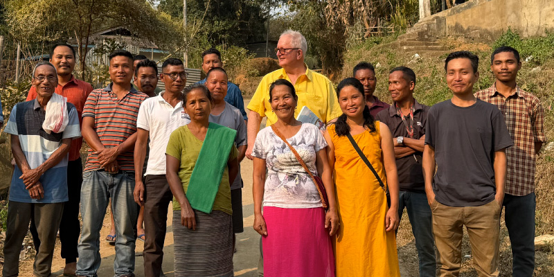 Lawry gathers for photo with members of Chokpot community forest management committee in South Garo Hills, India (2025).