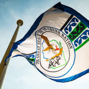 The flag of the Ho-Chunk Nation dances in the wind following a flag-raising ceremony at the top of Bascom Hill in front of Bascom Hall at the University of Wisconsin-Madison on Sept. 15, 2022. Photo credit: Bryce Richter / UW–Madison