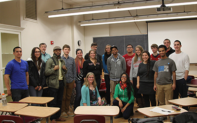 Group photo of community environmental scholars in a classroom