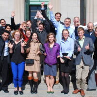 Large group of Energy Analysis and Policy posing on the steps of a government building