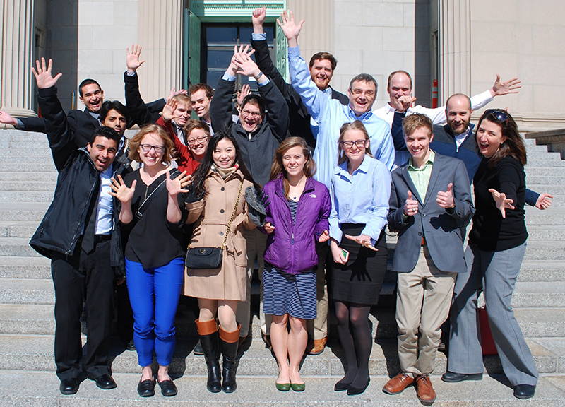 Large group of Energy Analysis and Policy posing on the steps of a government building