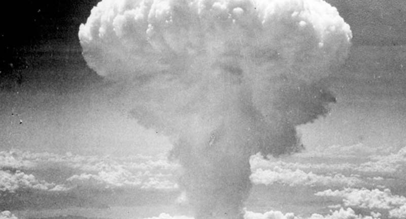 Black and white image of a mushroom cloud.