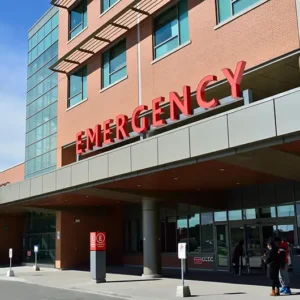 Exterior view of an emergency room entrance at a hospital.