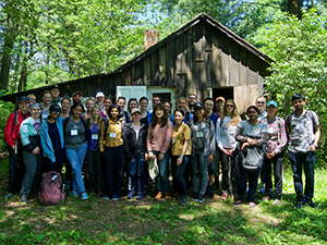 Group photo of environmental conservation students at the Aldo Leopold shack